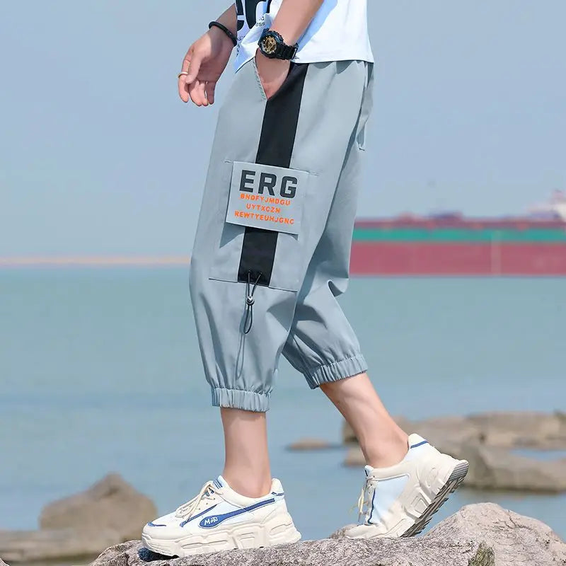 Neueste Cropped Pants Herren Overalls Sommer Dünn Lässig Trend Jugend Student Cargohose Lockere konisch zulaufende Reithose