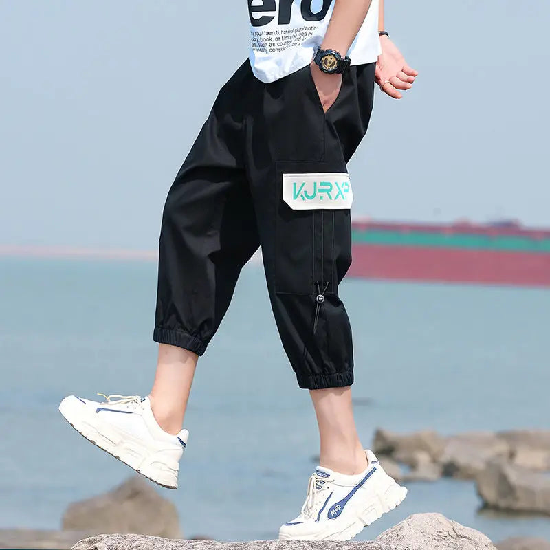 Neueste Cropped Pants Herren Overalls Sommer Dünn Lässig Trend Jugend Student Cargohose Lockere konisch zulaufende Reithose