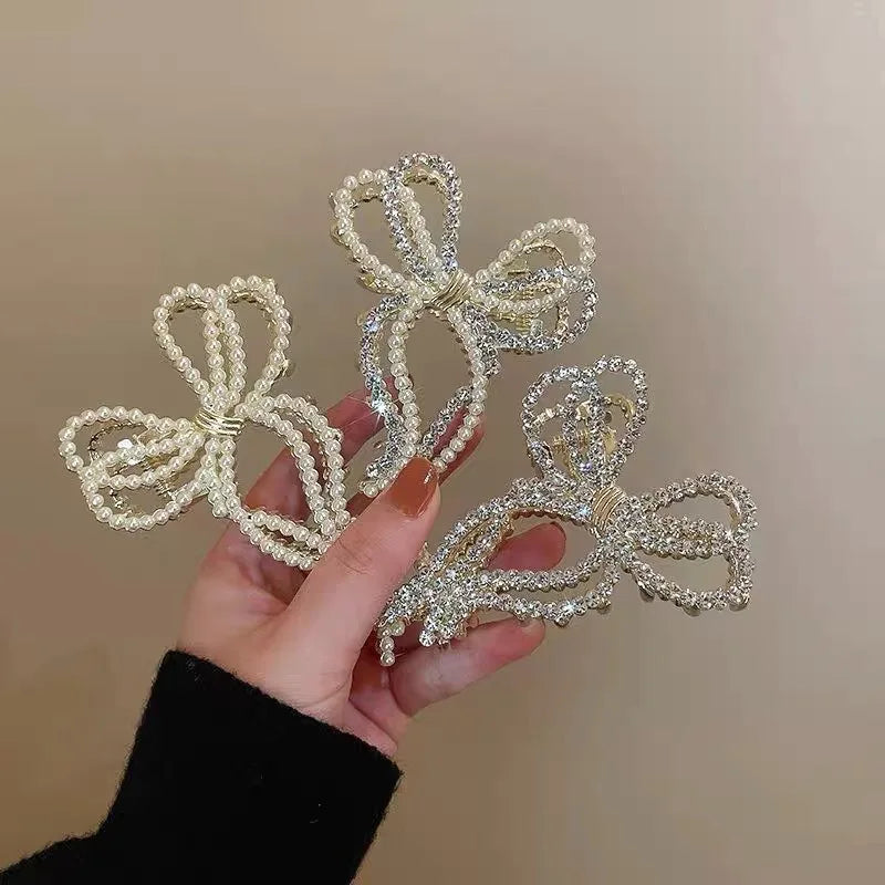 Fashion Pearl Hair Claw Clip for Women Pearl Bow Claw clip Metal Hair Accessories Hollow Barrette Crystal Ponytail Clip Ornament