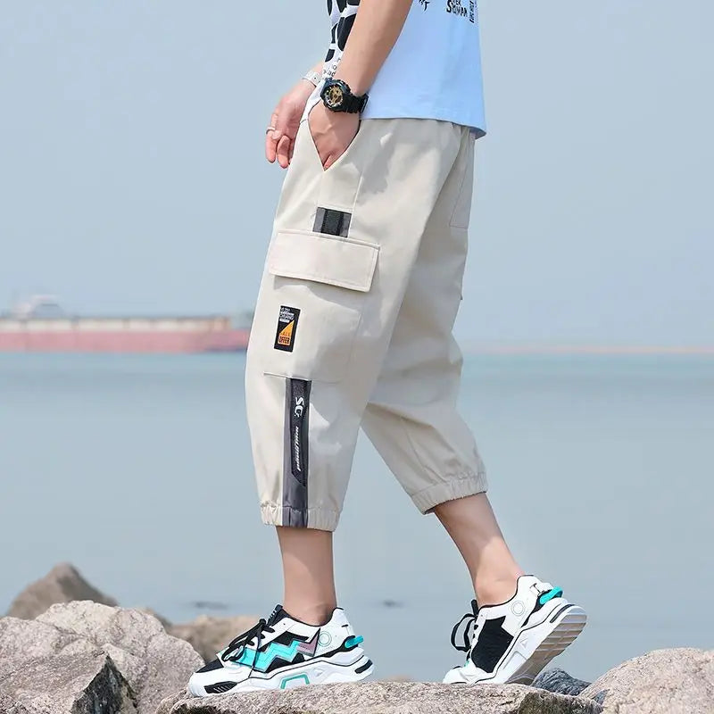 Neueste Cropped Pants Herren Overalls Sommer Dünn Lässig Trend Jugend Student Cargohose Lockere konisch zulaufende Reithose