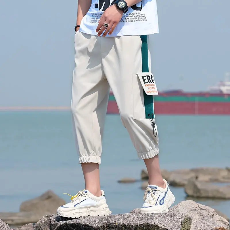 Neueste Cropped Pants Herren Overalls Sommer Dünn Lässig Trend Jugend Student Cargohose Lockere konisch zulaufende Reithose