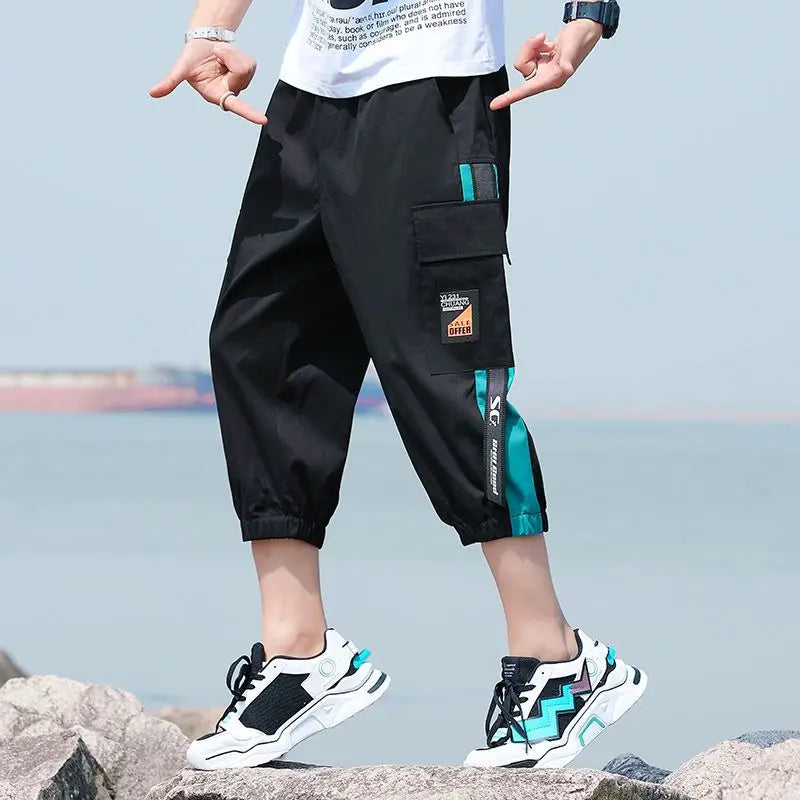 Neueste Cropped Pants Herren Overalls Sommer Dünn Lässig Trend Jugend Student Cargohose Lockere konisch zulaufende Reithose 