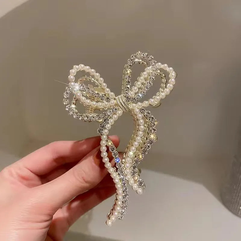 Fashion Pearl Hair Claw Clip for Women Pearl Bow Claw clip Metal Hair Accessories Hollow Barrette Crystal Ponytail Clip Ornament