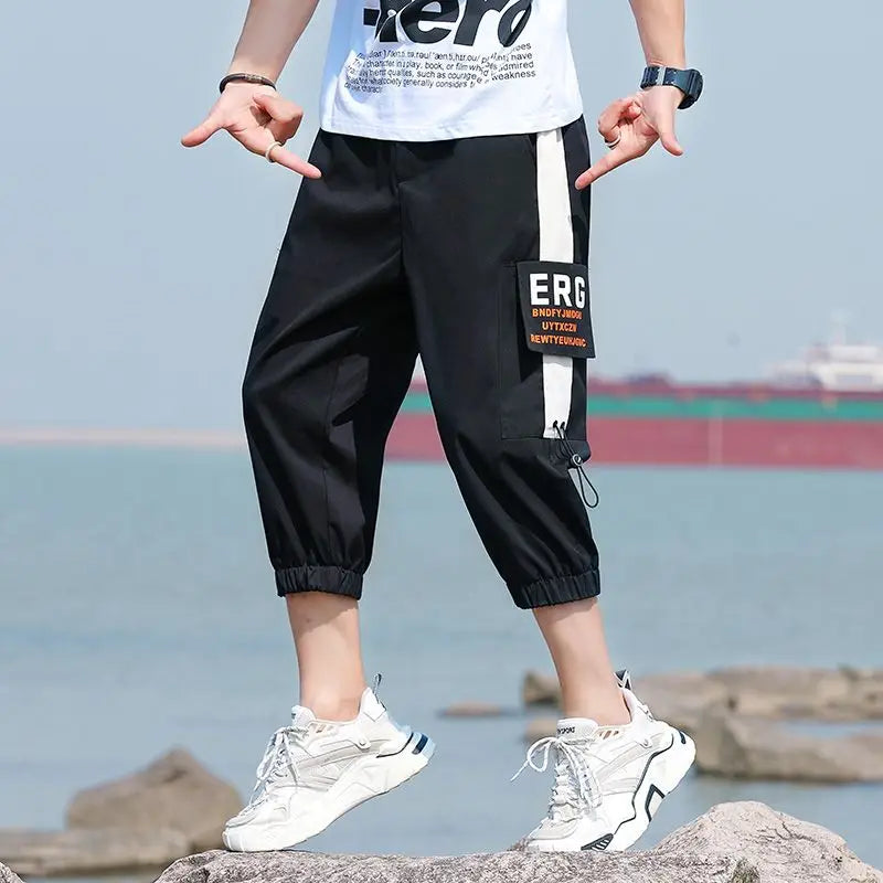 Neueste Cropped Pants Herren Overalls Sommer Dünn Lässig Trend Jugend Student Cargohose Lockere konisch zulaufende Reithose 