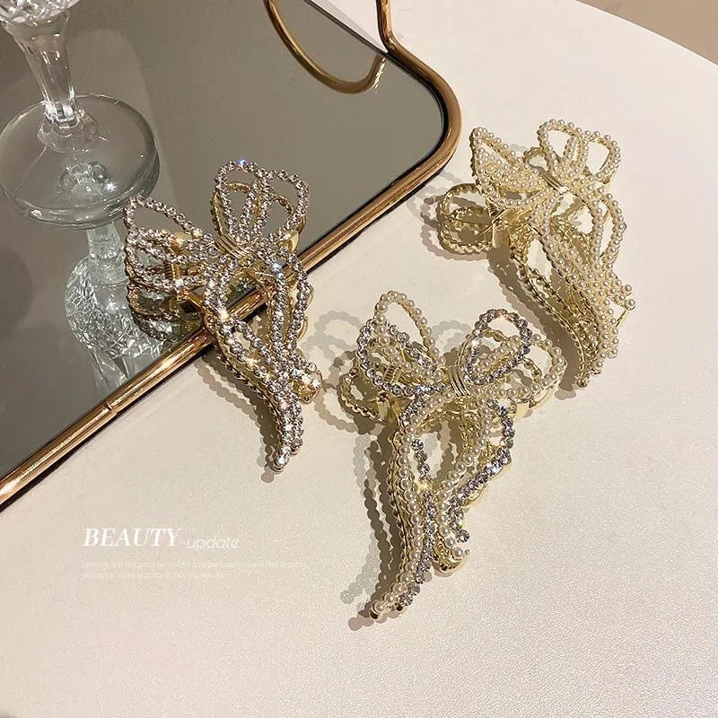 Fashion Pearl Hair Claw Clip for Women Pearl Bow Claw clip Metal Hair Accessories Hollow Barrette Crystal Ponytail Clip Ornament