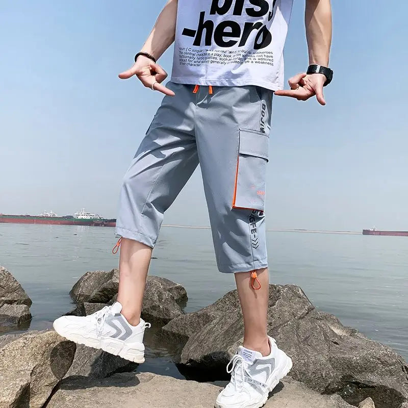 Neueste Cropped Pants Herren Overalls Sommer Dünn Lässig Trend Jugend Student Cargohose Lockere konisch zulaufende Reithose 